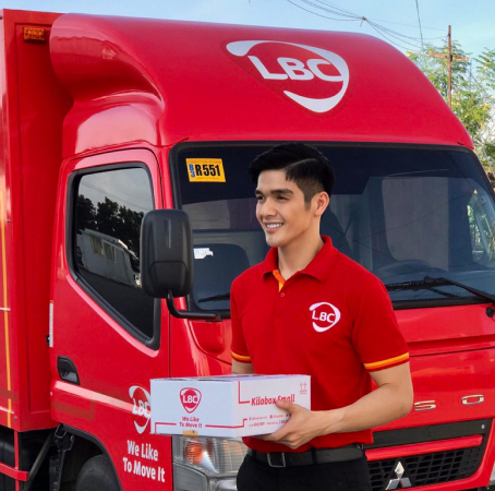 delivery man holding a box
